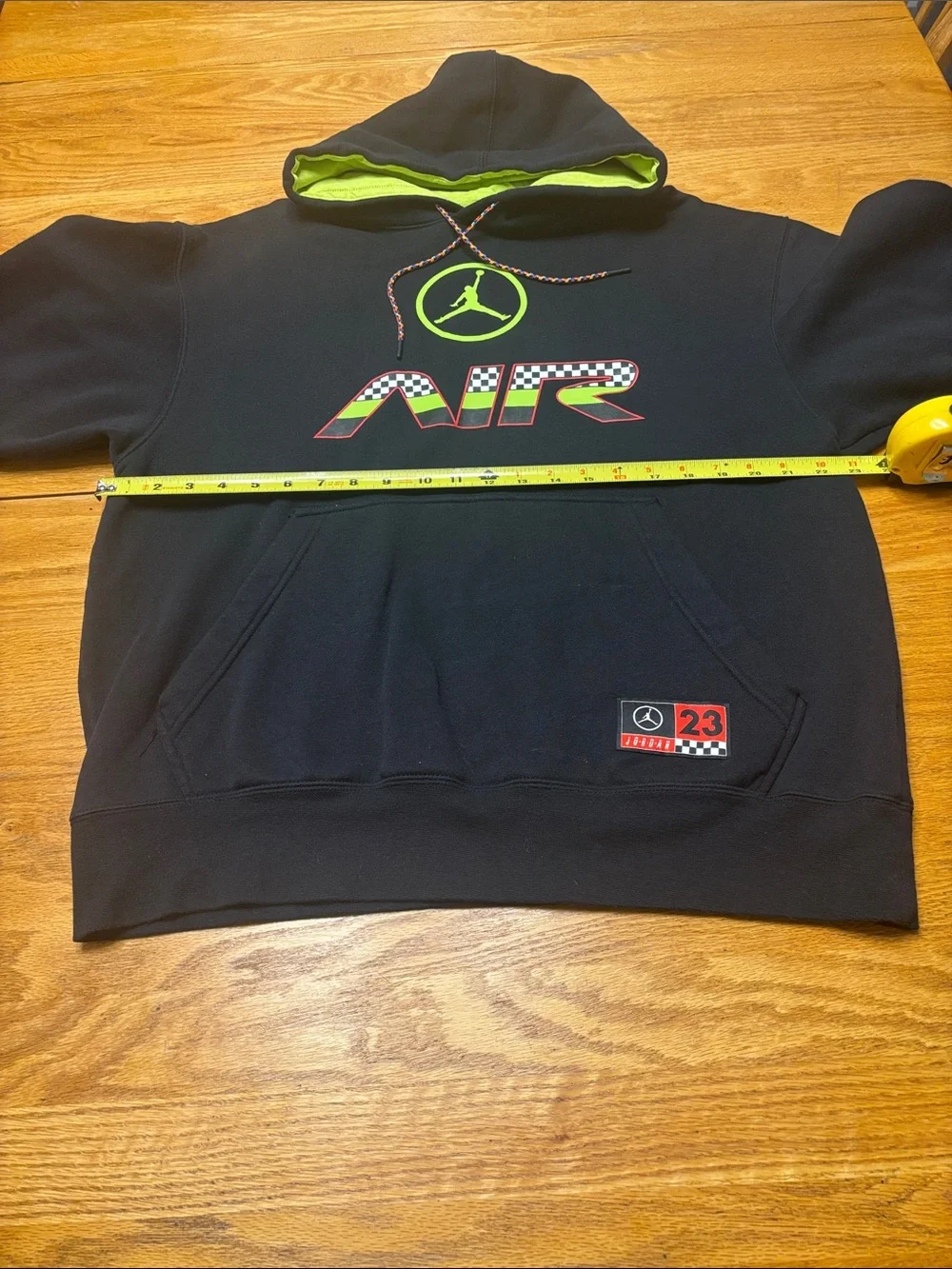 Jordan Men's Black Hoodie with Neon Lime Lining and Multicolor AIR Graphic